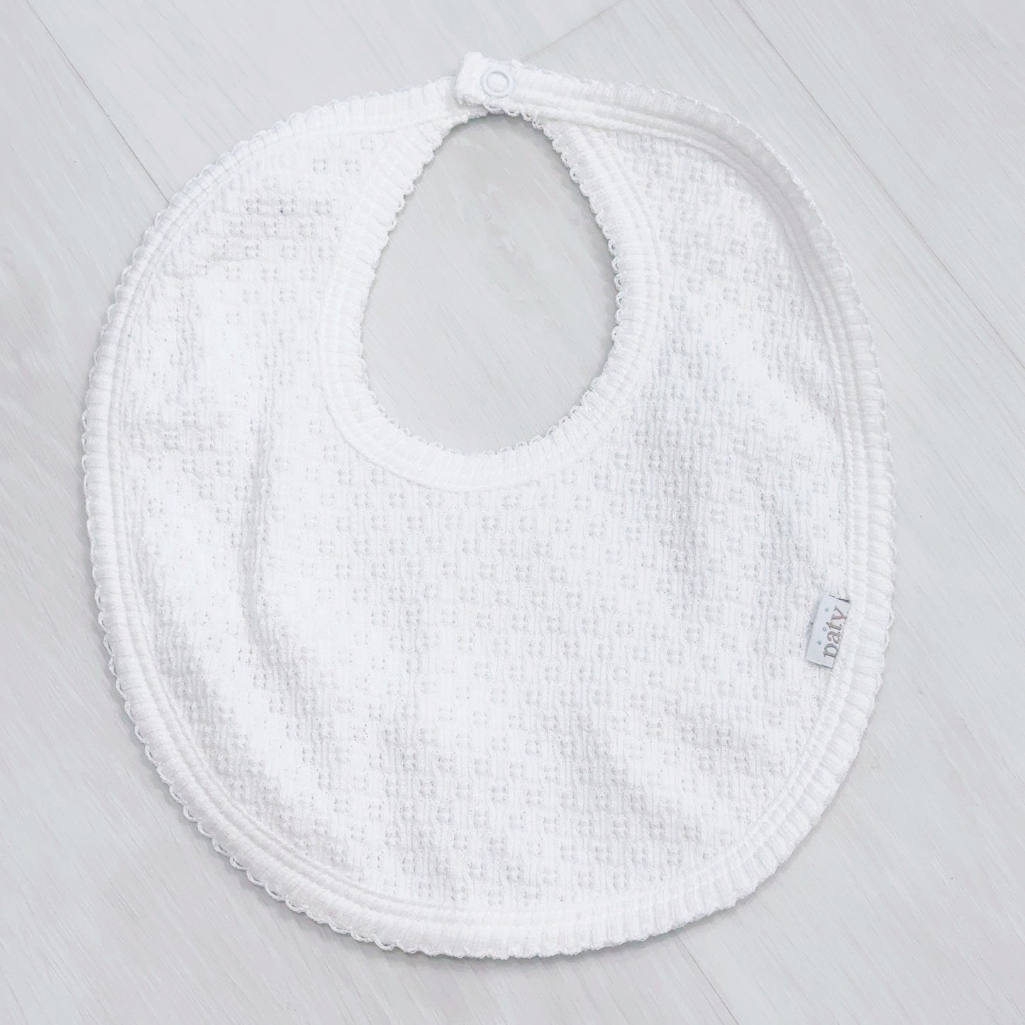 Paty Bib (White w/ White Trim)