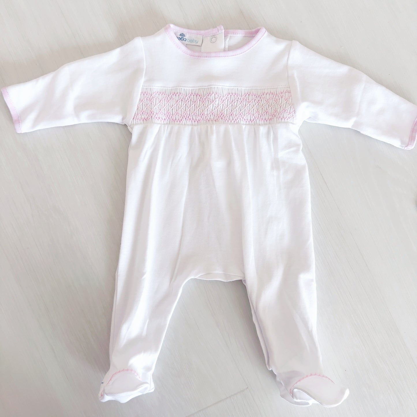 Megan White Smocked Footie (Pink Trim)